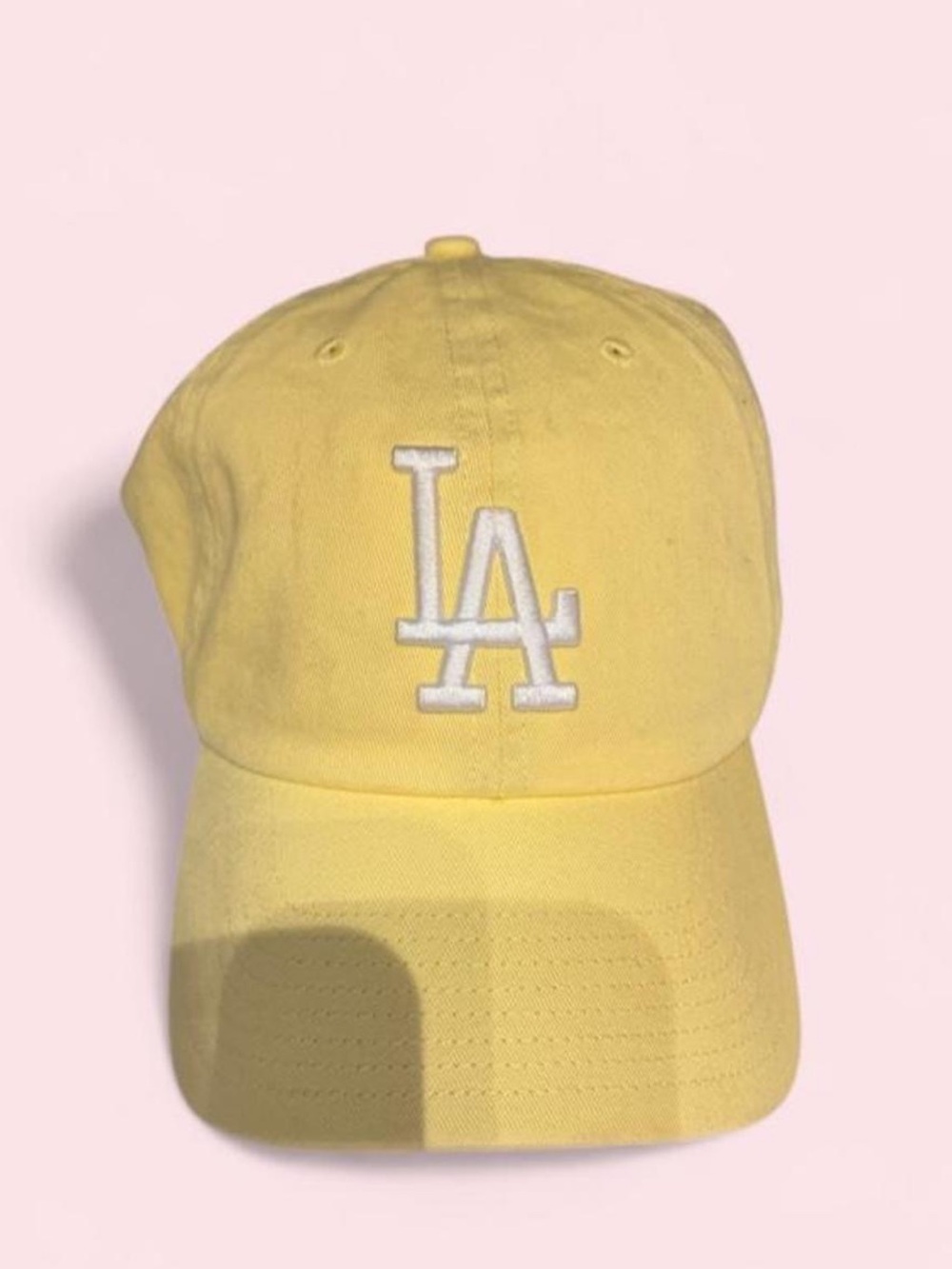 Yellow LA Dodgers baseball cap with White “LA” Logo